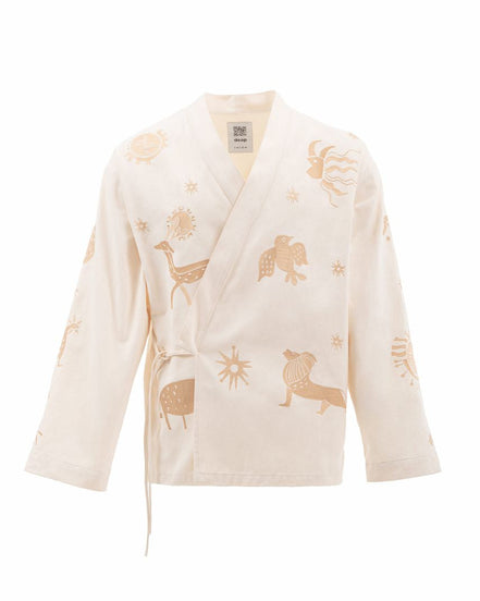 Beige cardigan with animal prints on a white background