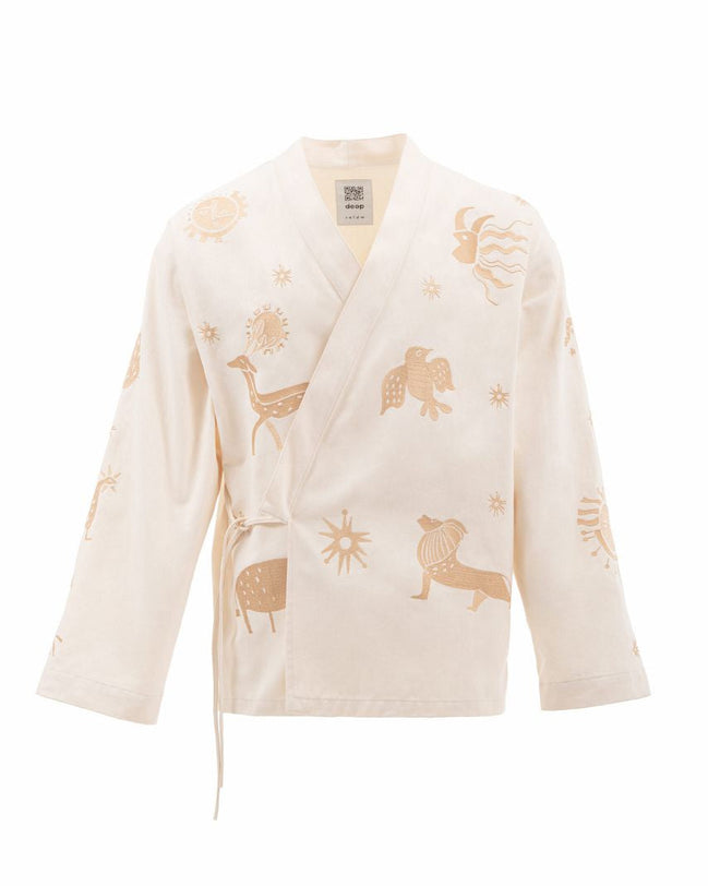 Beige cardigan with animal prints on a white background