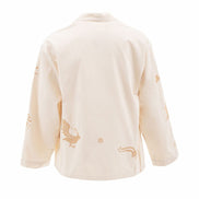 Beige cardigan with embroidered designs on a white background