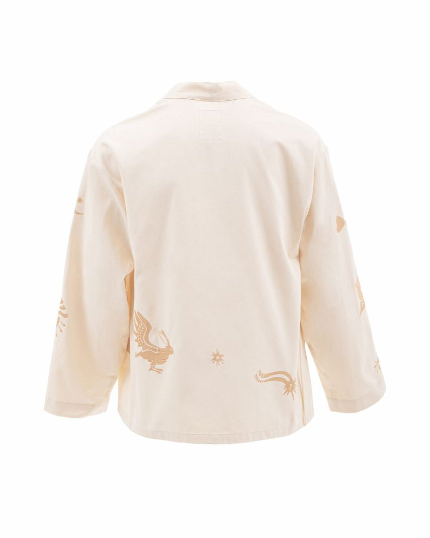 Beige cardigan with embroidered designs on a white background