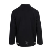 Black jacket with white embroidery on a white background