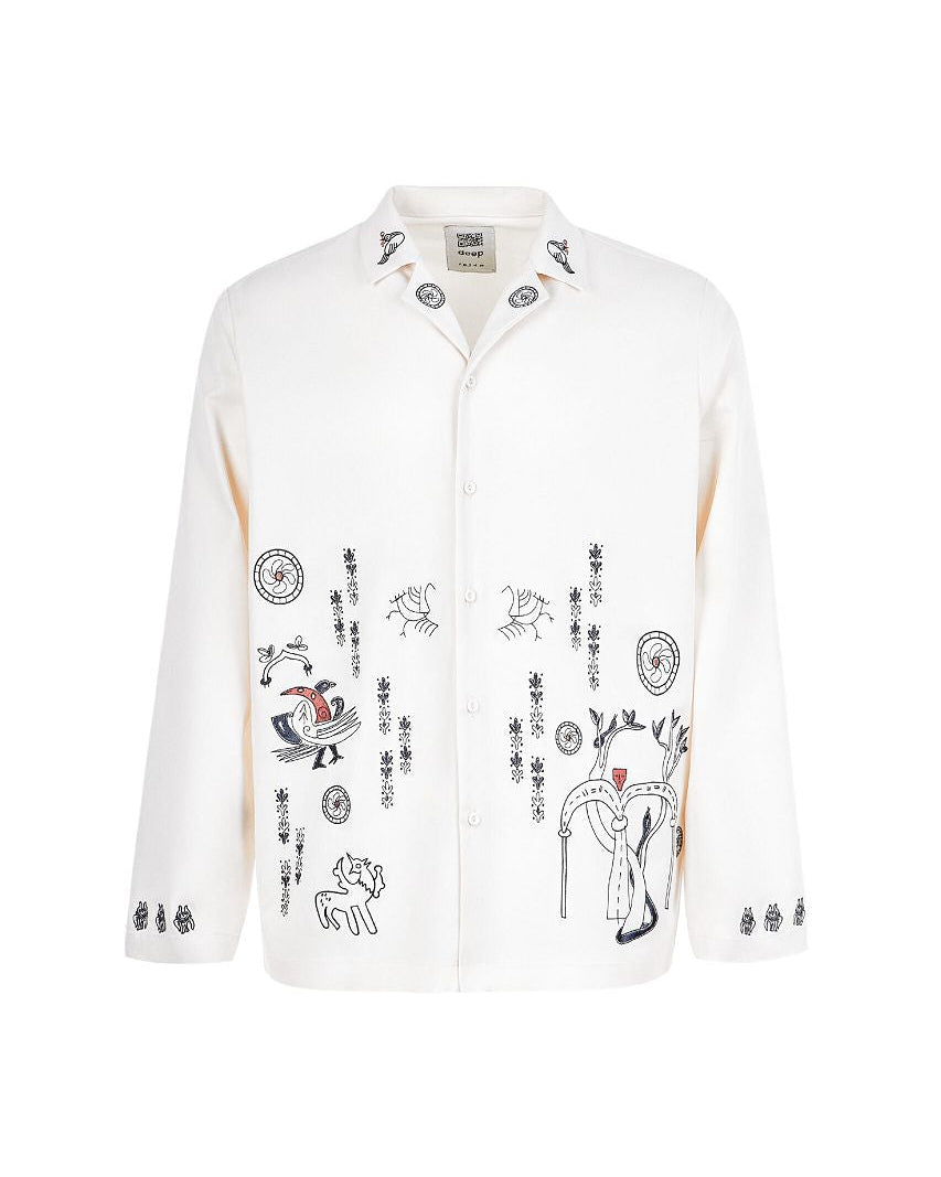 White shirt with black and red graphic designs on a white background