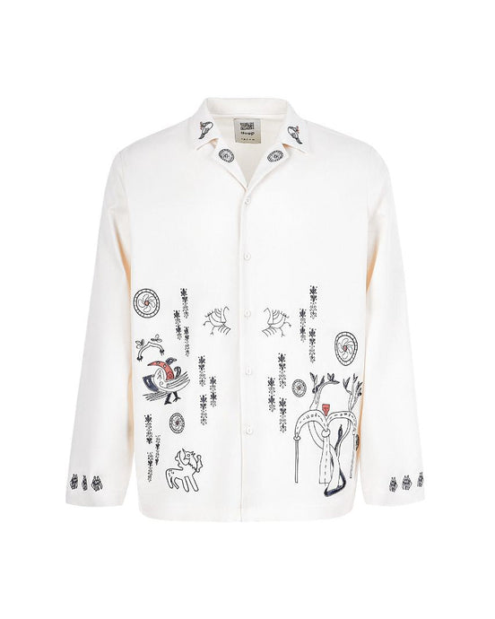 White shirt with black and red graphic designs on a white background