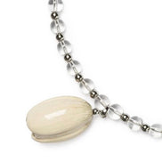 Necklace with a large cream-colored bead and smaller clear beads on a white background