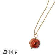 Necklace with a brown pendant on a white background
